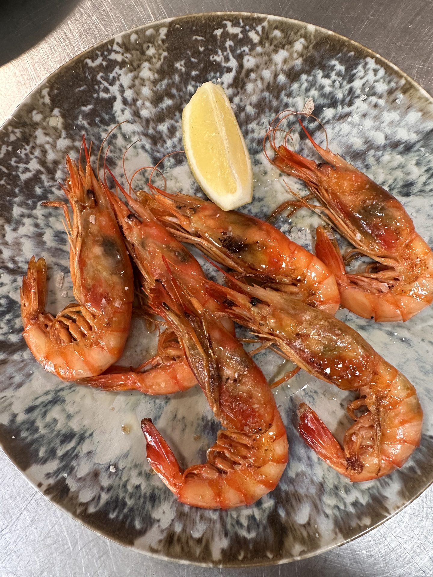 Gambes vermelles a la planxa