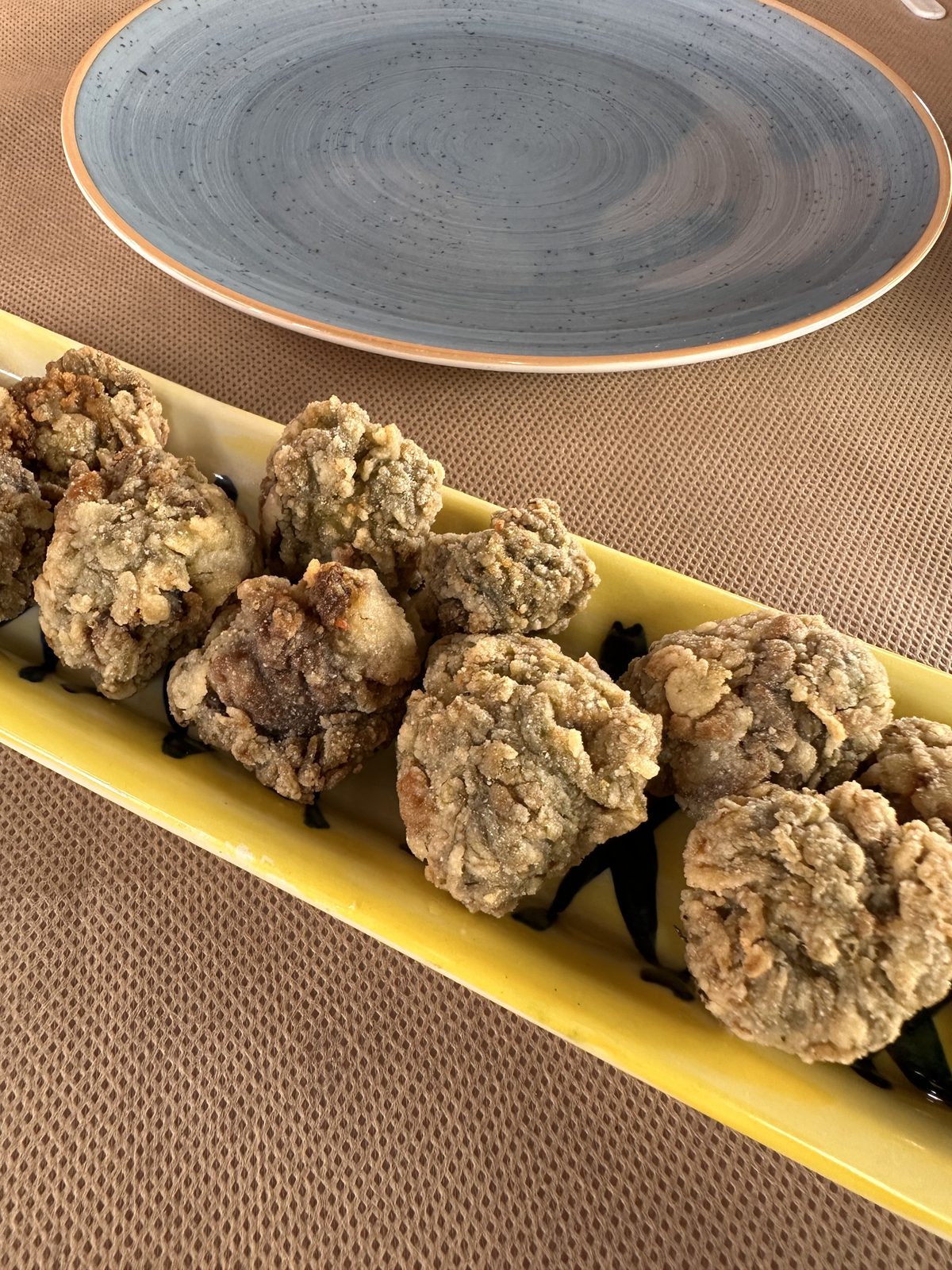 Ortigues de mar arrebossades, tapa del Delta